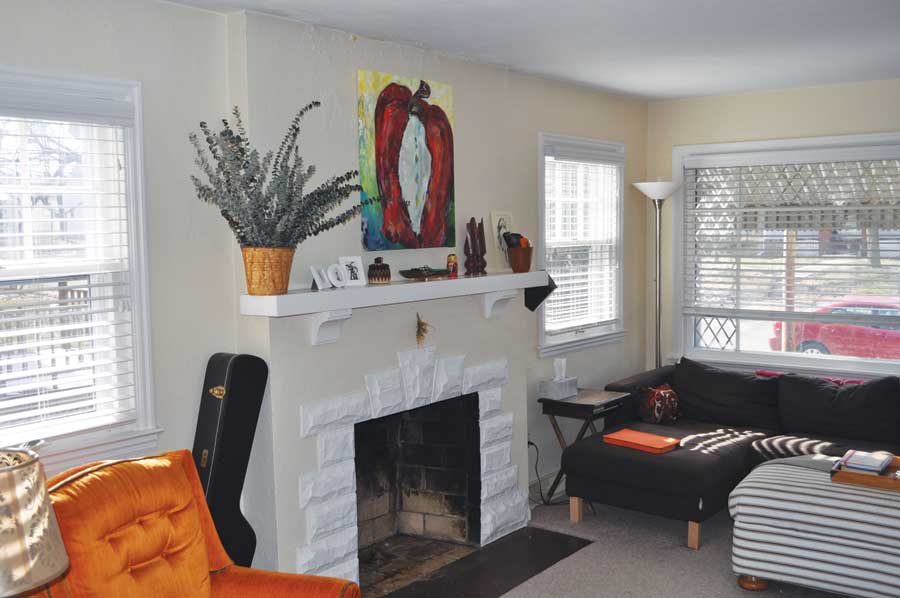 The home's large windows make it sunny, but single-pane glass loses a lot of heat.